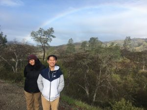 Jockusch lab undergraduates Lesley and Ruiwen in the Inner Coast Ranges, California, with rainbow in background